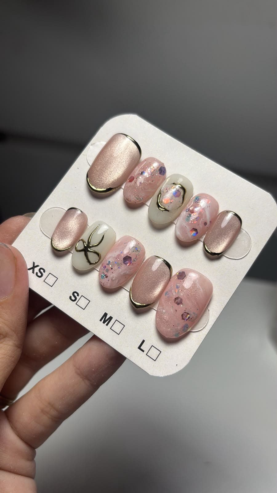 Hand-painted press-on nail set from the Glam Nails studio