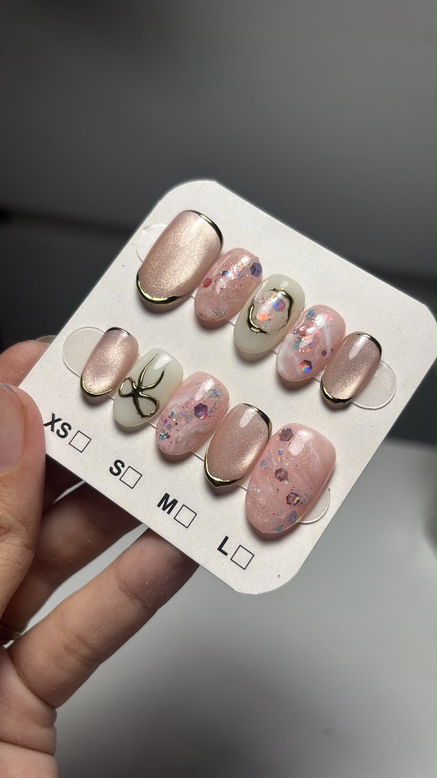 Hand-painted press-on nail set from the Glam Nails studio